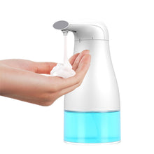 Load image into Gallery viewer, image showing person using automatic foam soap dispenser for countertop of worx clean and gentle brand